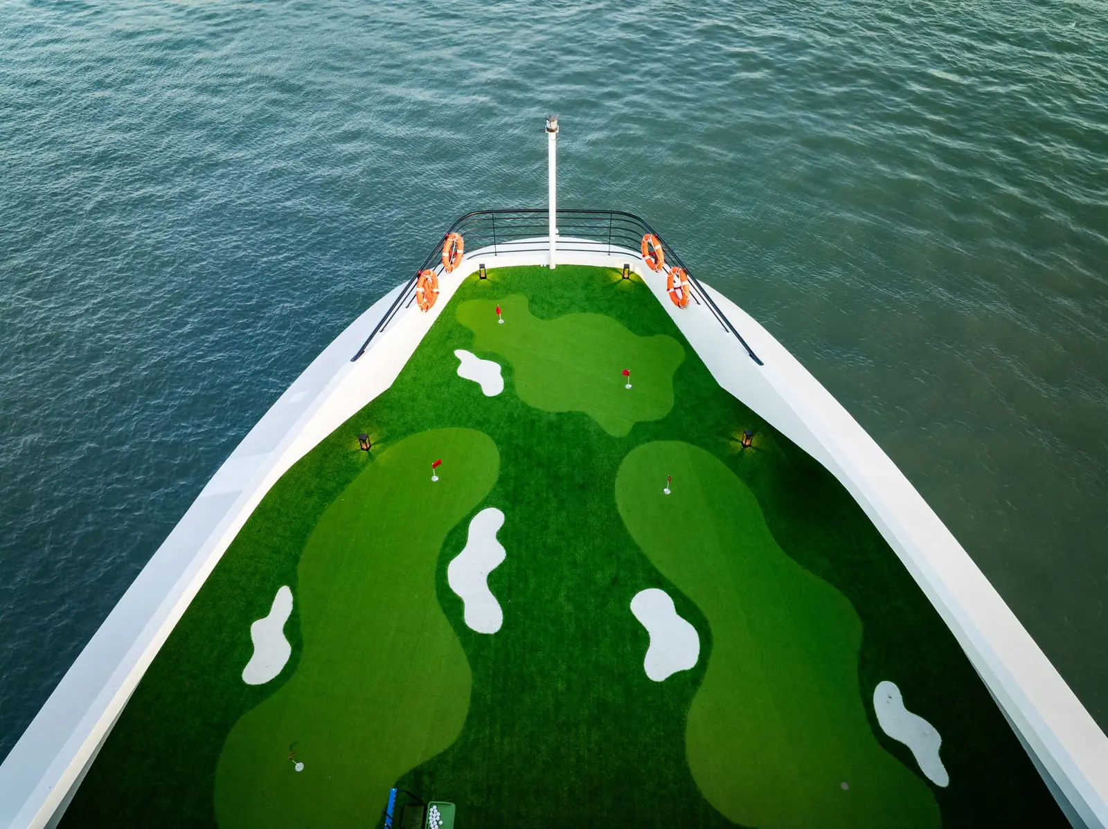 Mini golf green on the bow of Diana Cruise
