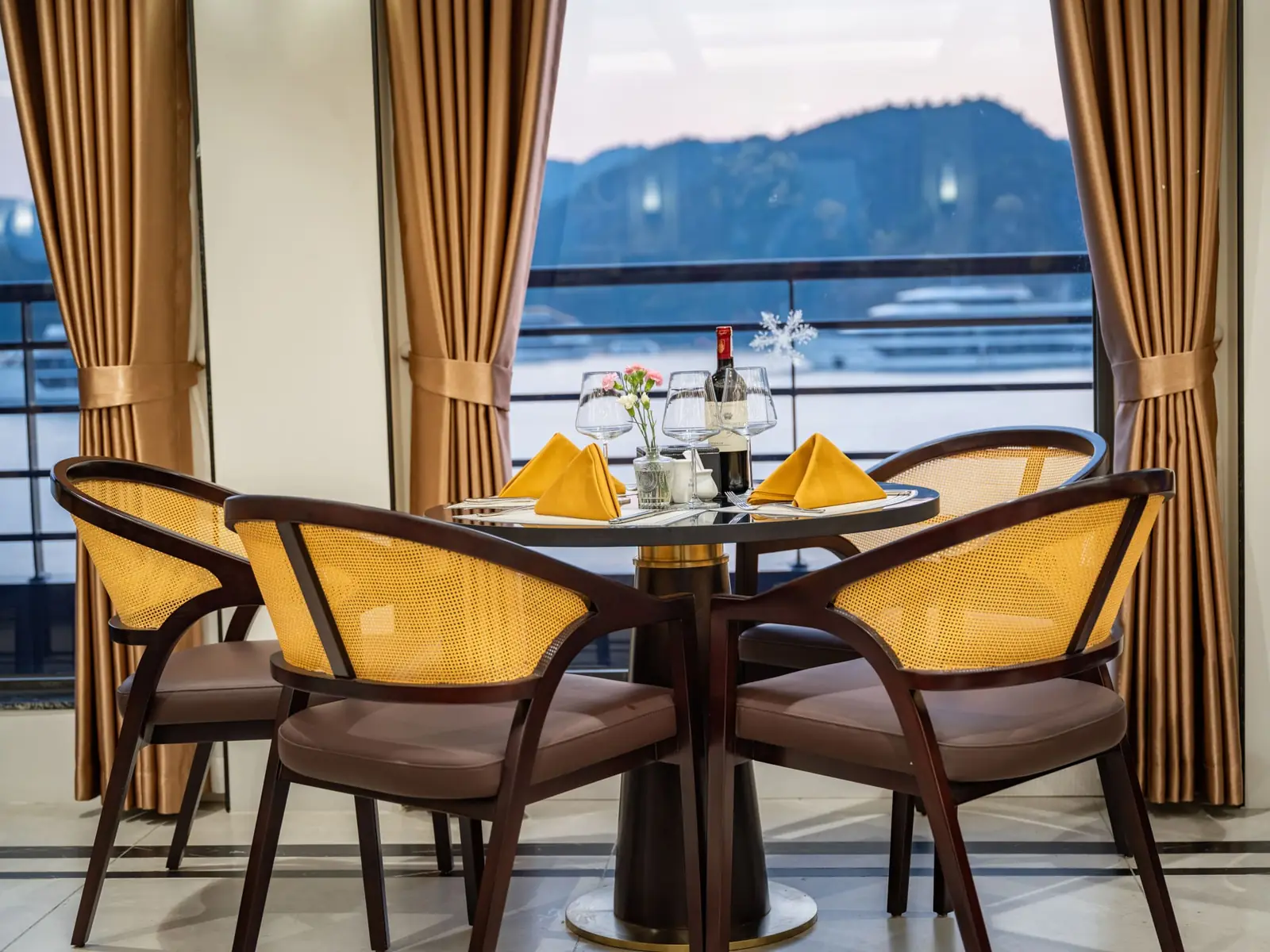 Restaurant table by the window on the 4th deck