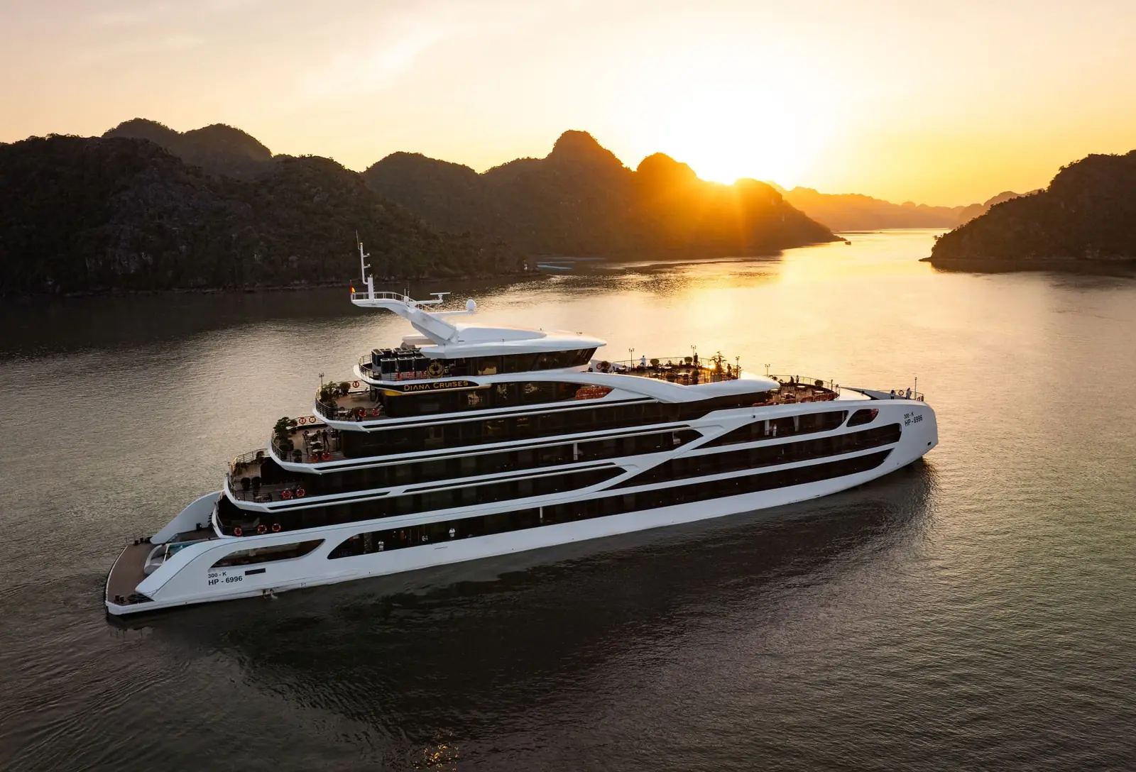 Diana Cruise at sunset among the karsts of Lan Ha Bay