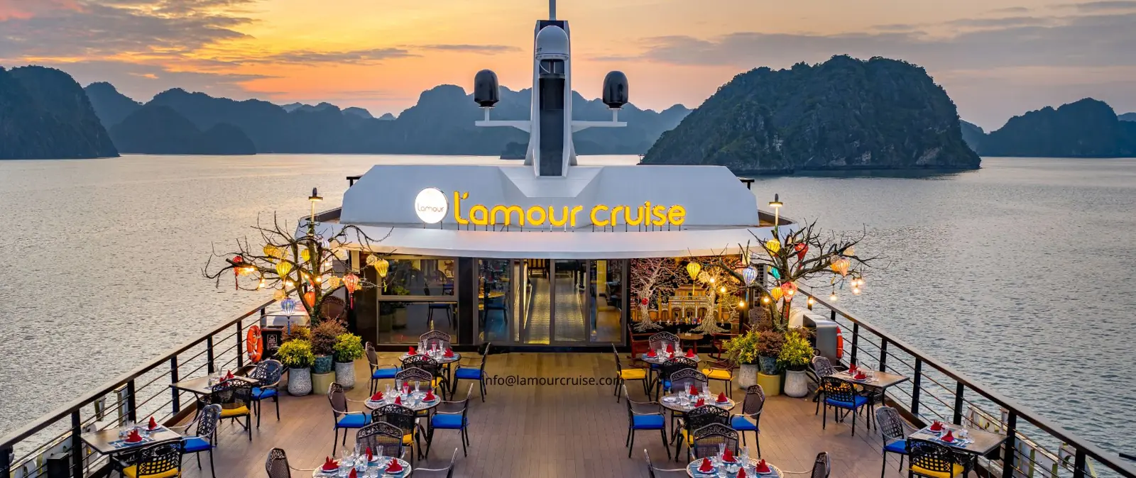 Dining on the open deck at sunset