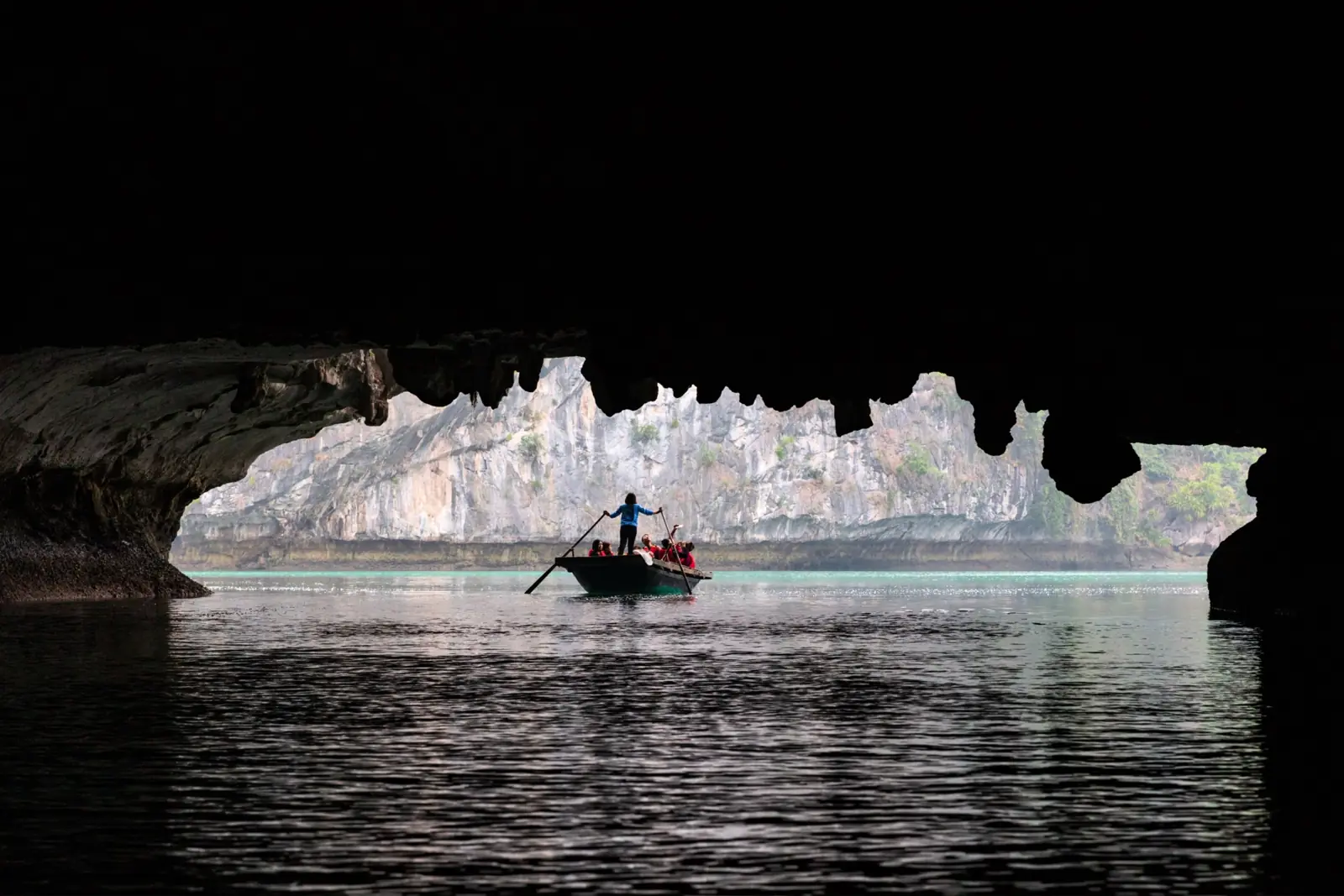 Bamboo rowing boat inside the Dark & Bright Cave