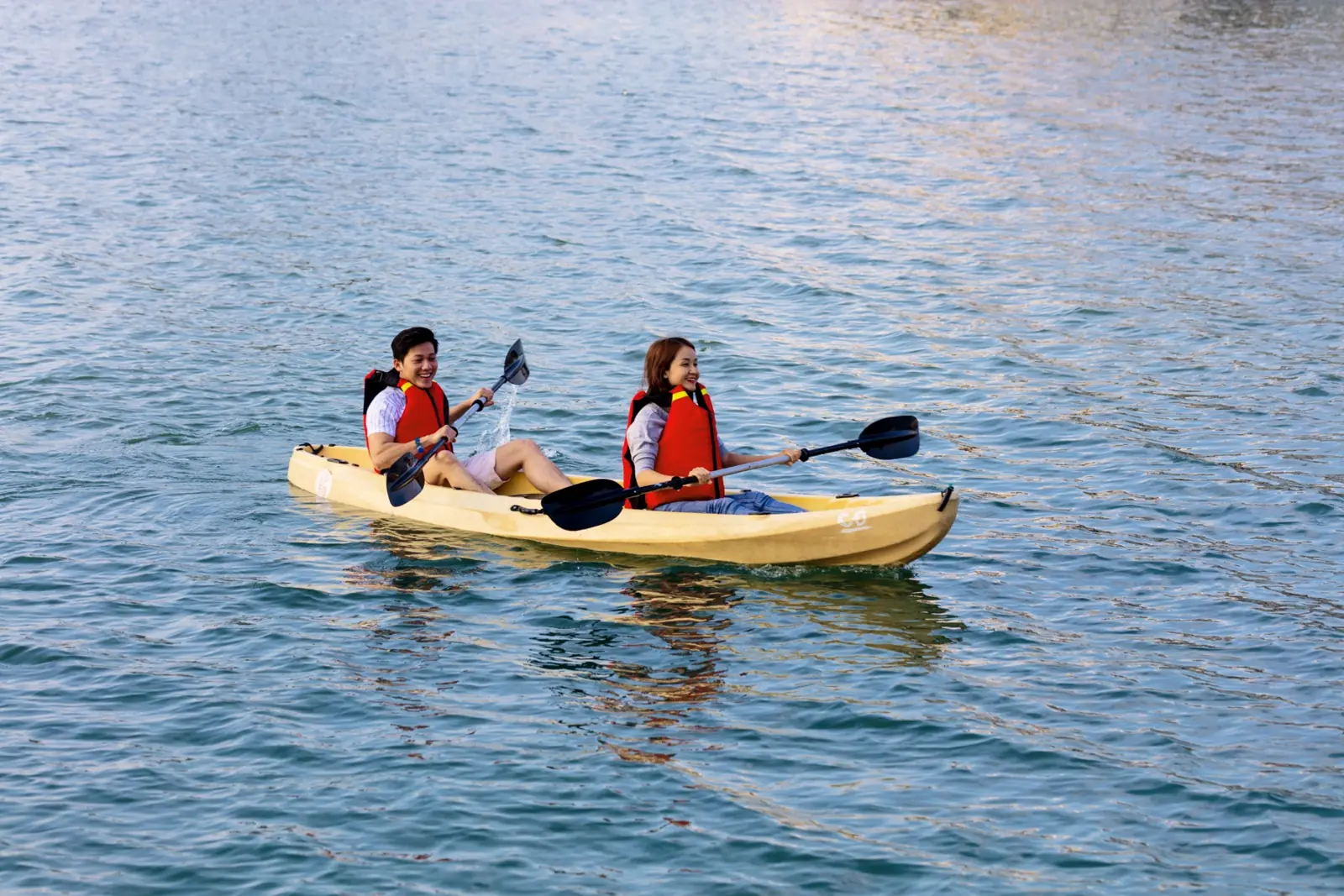 Couple kayaking on the bay