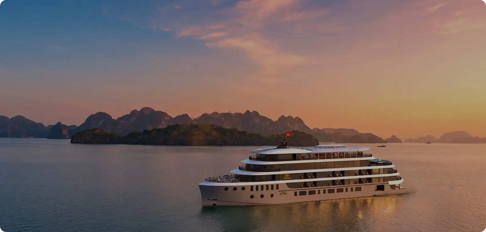 Orient Legacy Cruise at sunset in Lan Ha Bay