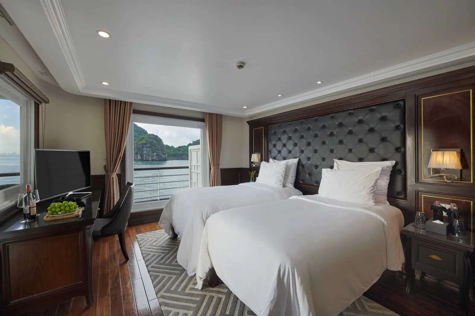 A twin cabin on Paradise Elegance with a bay view