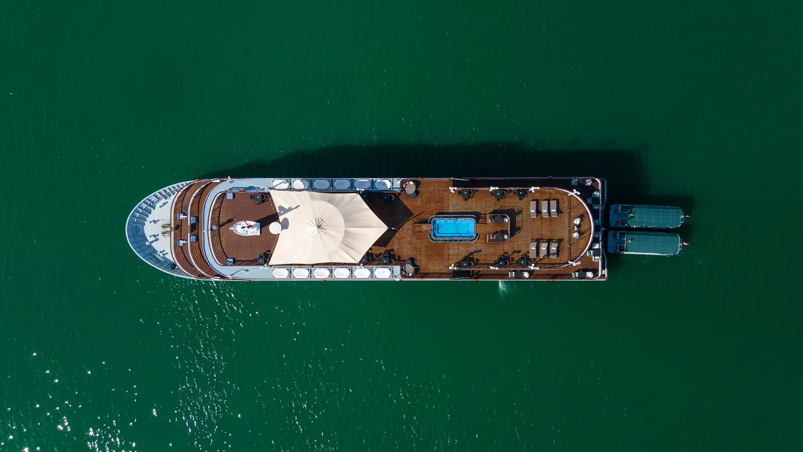 Paradise Elegance from above on the green water