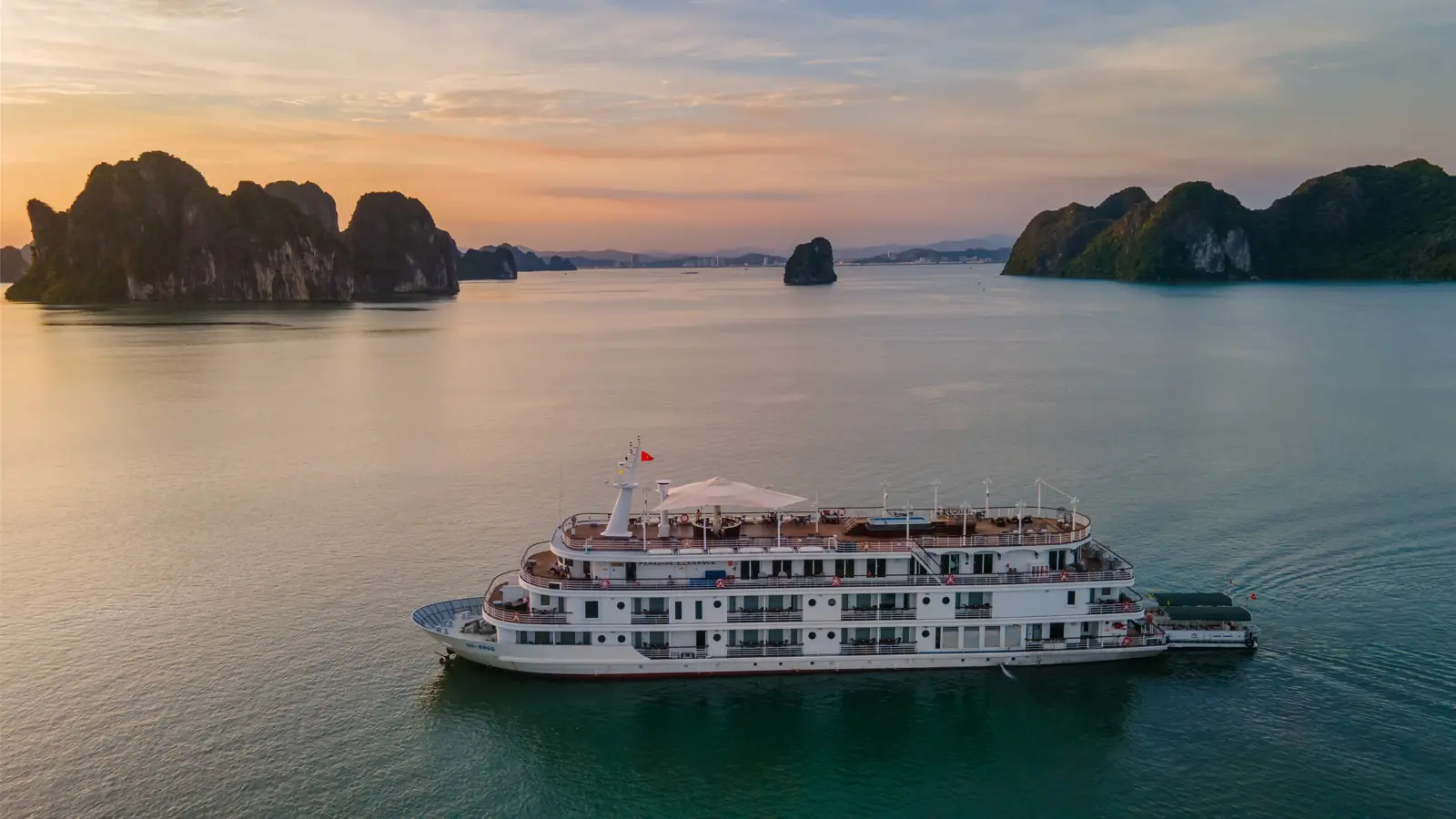 Paradise Elegance at anchor in Ha Long Bay at sunset