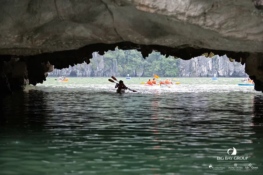 Kayaking under a rock arch