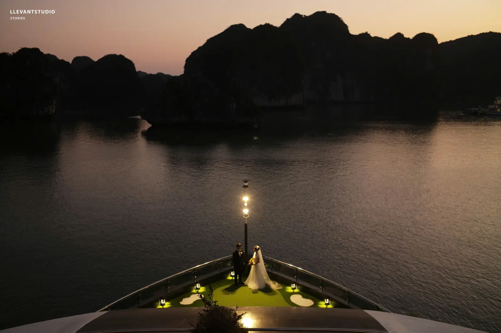 The bow of Dora Cruise at sunset