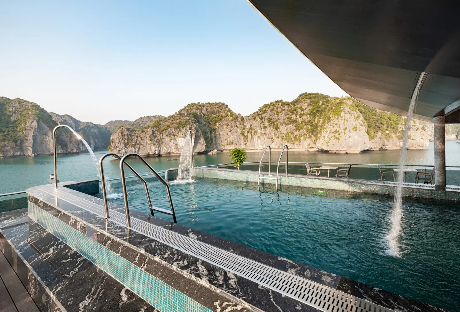 Pool and sun loungers on Dora Cruise