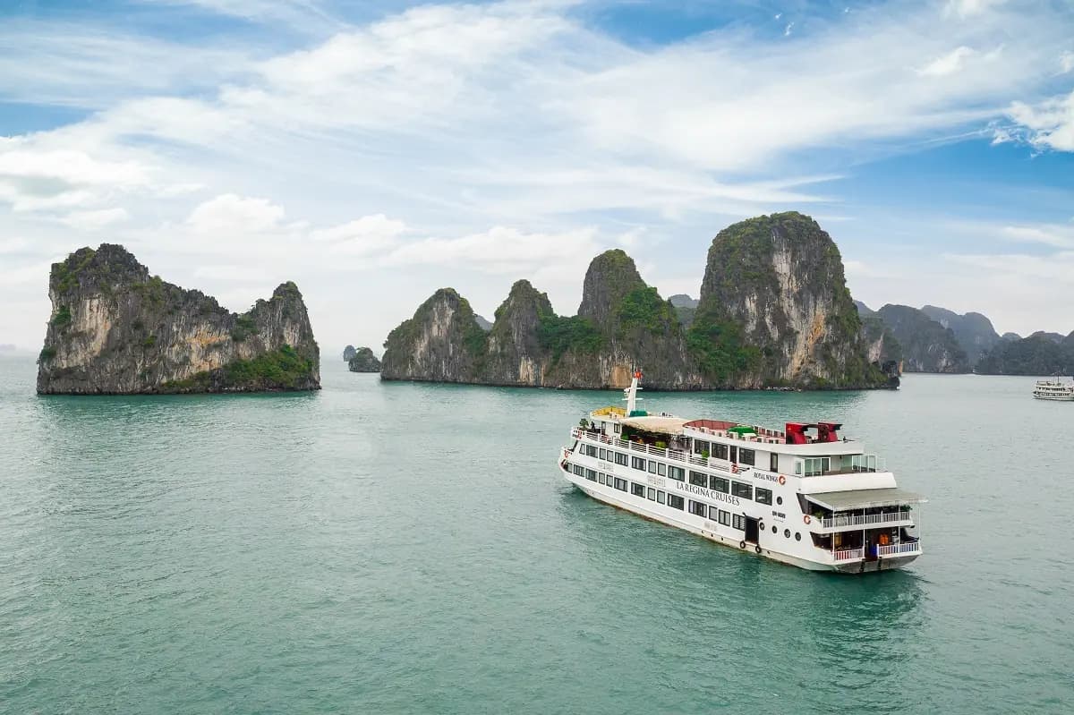 La Regina Royal sailing between the karsts of Ha Long Bay