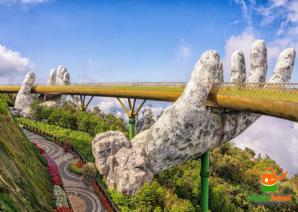 Golden Bridge held by giant stone hands at Ba Na Hills, Da Nang