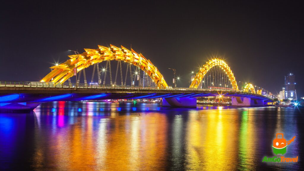 Dragon Bridge lit up at night over the Han River, Da Nang