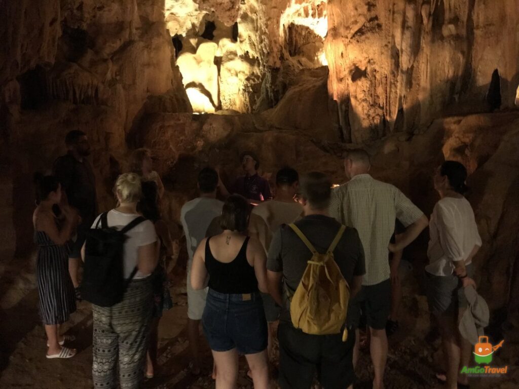 Guests visiting a cave with La Regina Royal Cruise