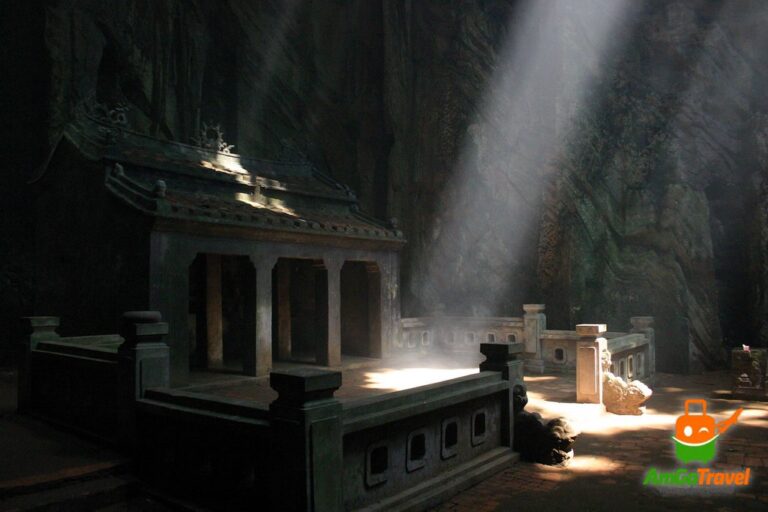 Marble Mountains and My Son tour: Sunbeams lighting a cave temple in the Marble Mountains