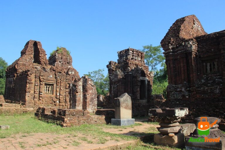 My Son sunset tour: Cham towers of My Son Sanctuary under a blue sky