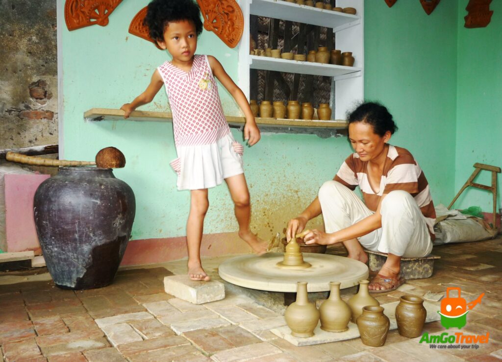 Potter at work in Thanh Ha Pottery Village, Hoi An